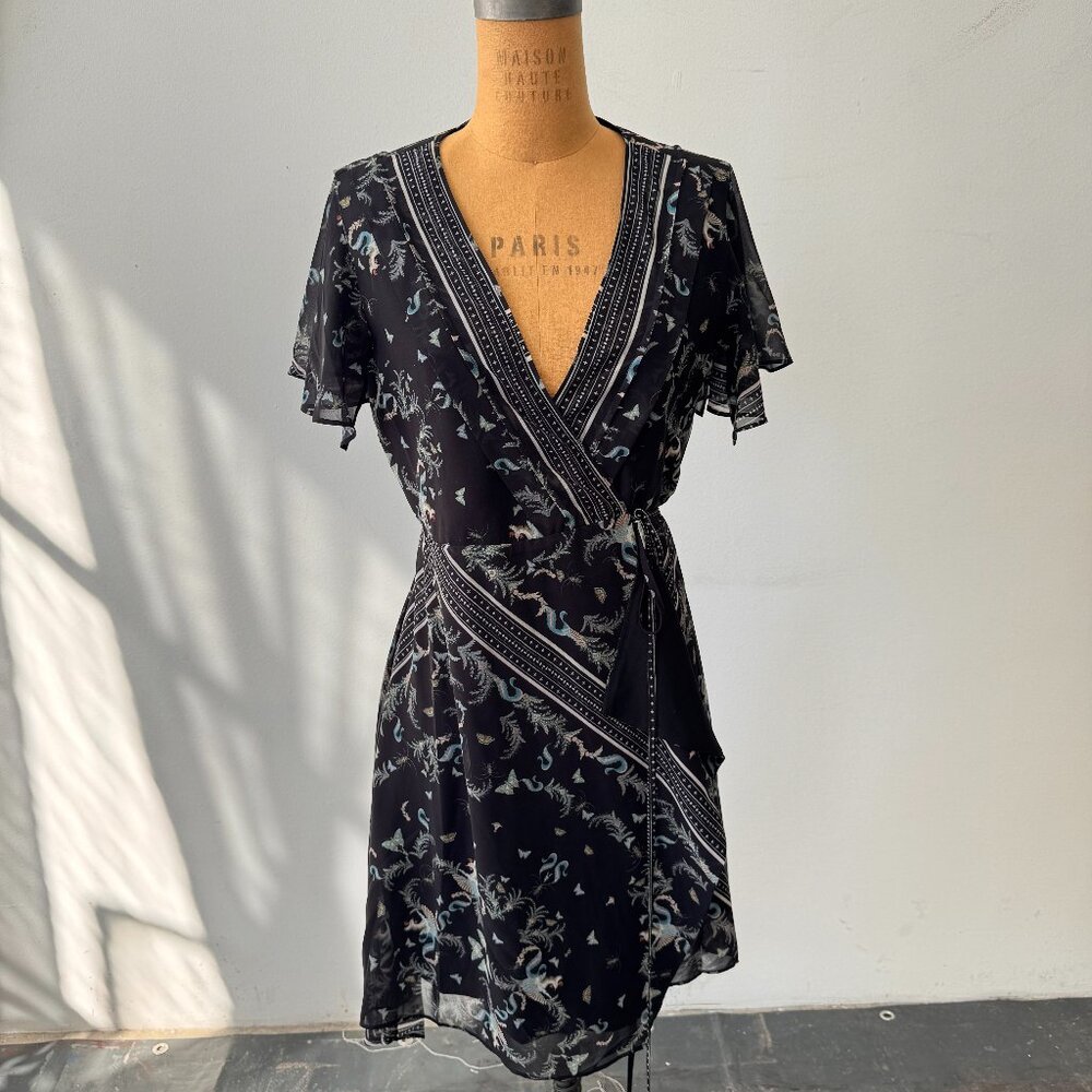 Wrap around dress with asymmetrical hem
